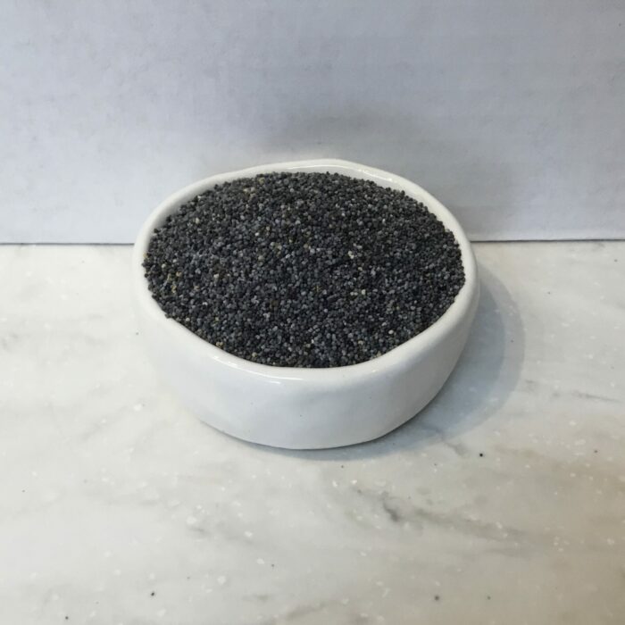 Poppy seeds are tiny, oil-rich seeds harvested from the Papaver somniferum plant. These small, kidney-shaped seeds possess a mild, nutty flavor.