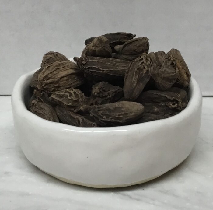 Black Cardamom pods are widely used in Indian and Southeast Asian cuisine and have a smoky, earthy flavor. They are commonly used in curries or stews.