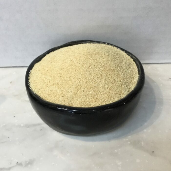 Granulated garlic has been dehydrated and ground into small, coarse granules. It offers a convenient way to incorporate the flavor of fresh garlic into dishes.