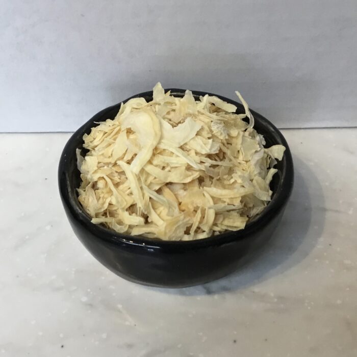 Dried onion is a versatile pantry staple made by dehydrating fresh onions to remove moisture, resulting in a concentrated form of onion flavor.