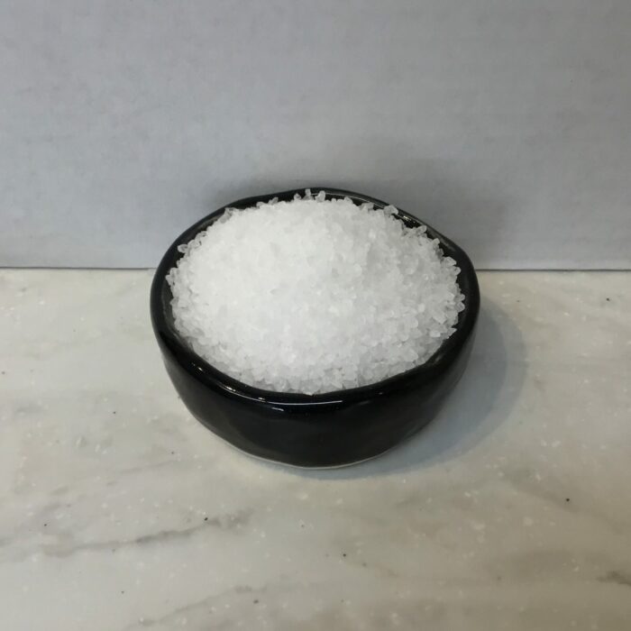 Sea salt is a type of salt produced by the evaporation of seawater. It is prized for its coarse texture, mineral-rich composition, and distinct flavor.