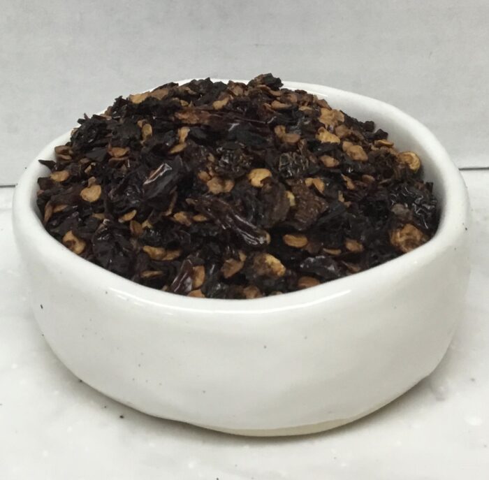 Chipotle pepper flakes are smoked and dried jalapeños that that have been allowed to ripen to a deep red. Great in Mexican and Tex-Mex cuisine.