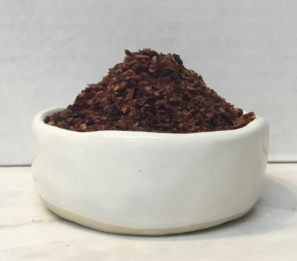 Aleppo pepper is a mild, fruity chili used in Middle Eastern and Mediterranean cuisine to add a subtle, tangy heat to meats, salads, and vegetables.