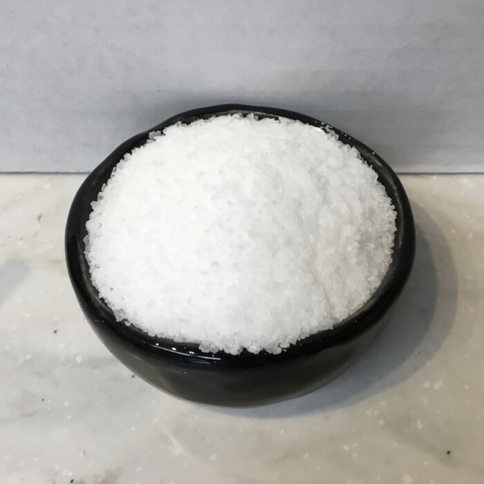 Flake salt is a type of salt characterized by its delicate, thin, irregularly shaped flakes. It is typically harvested from evaporated seawater.