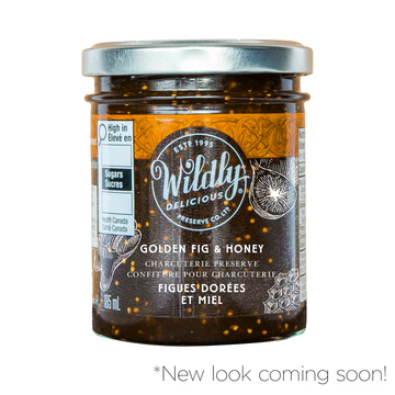 Wildly Delicious Golden Fig & Honey Preserve blends rich figs and honey. Great for cheese boards, toast, desserts, and gourmet entertaining.