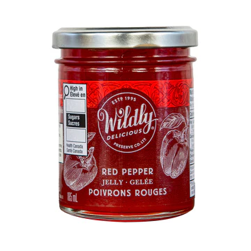 Wildly Delicious Red Pepper Jelly offers sweet pepper flavour with mild heat. Perfect for cheese boards, appetizers, sandwiches, and gourmet cooking.