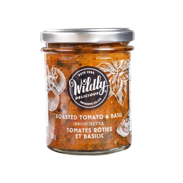 Wildly Delicious Roasted Tomato & Basil Bruschetta, topping for crostini's, wraps, salads, or cheese boards. Ready to serve and full of bold flavour.