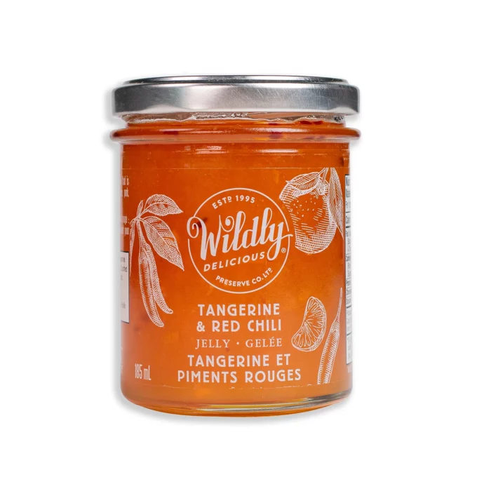 Wildly Delicious Tangerine & Red Chili Jelly, sweet tangerine meets a gentle chili kick in this bold, zesty jelly—perfect for meats, cheeses, and more.