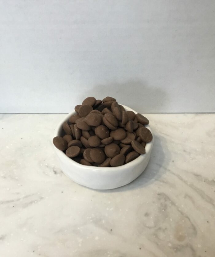 Finest Belgian milk chocolate callets with rich cocoa, creamy caramel, and vanilla. Ethically sourced and 100% sustainable.