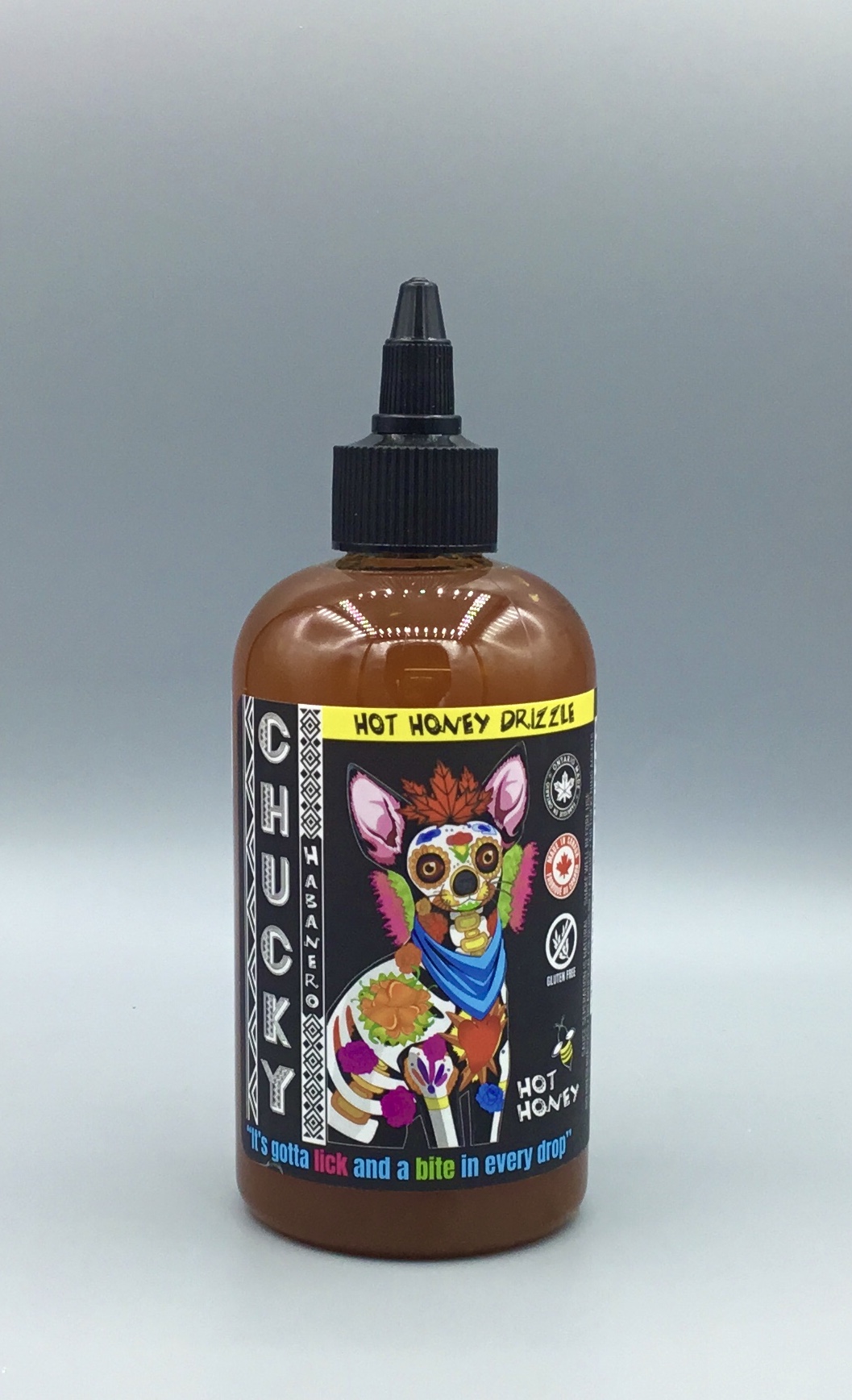 Chunky habanero (1) Hot Honey Drizzle combines sweet honey with habanero heat for pizza, chicken, wings, cheese, vegetables, seafood and more